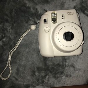 Polaroid camera. and holder.